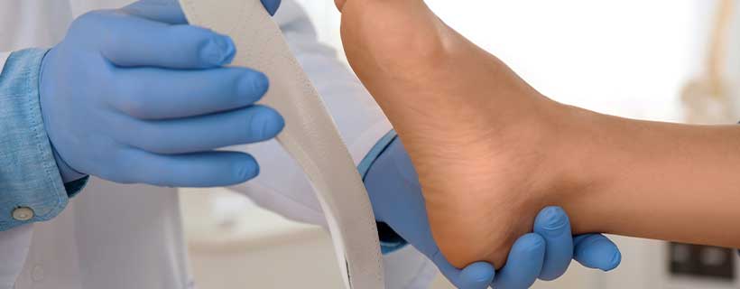 patient receiving custom orthotics in Charlotte, NC